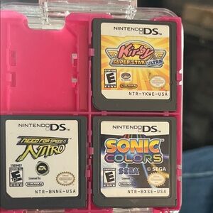 Nintendo Pink Game Card Case and 4 Games